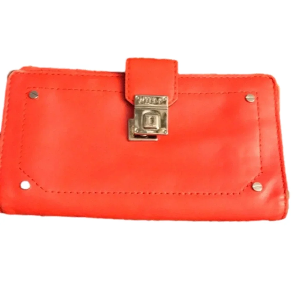 Milly wristlet orange mobile wallet front snap ,zip  lots of pockets